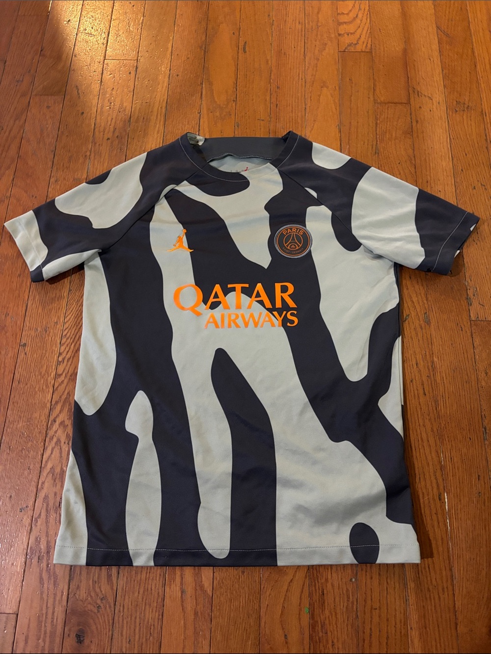 Jordan Paris Saint-Germain Kids' Camo Jersey- Black & Light Gray with Orange Log
